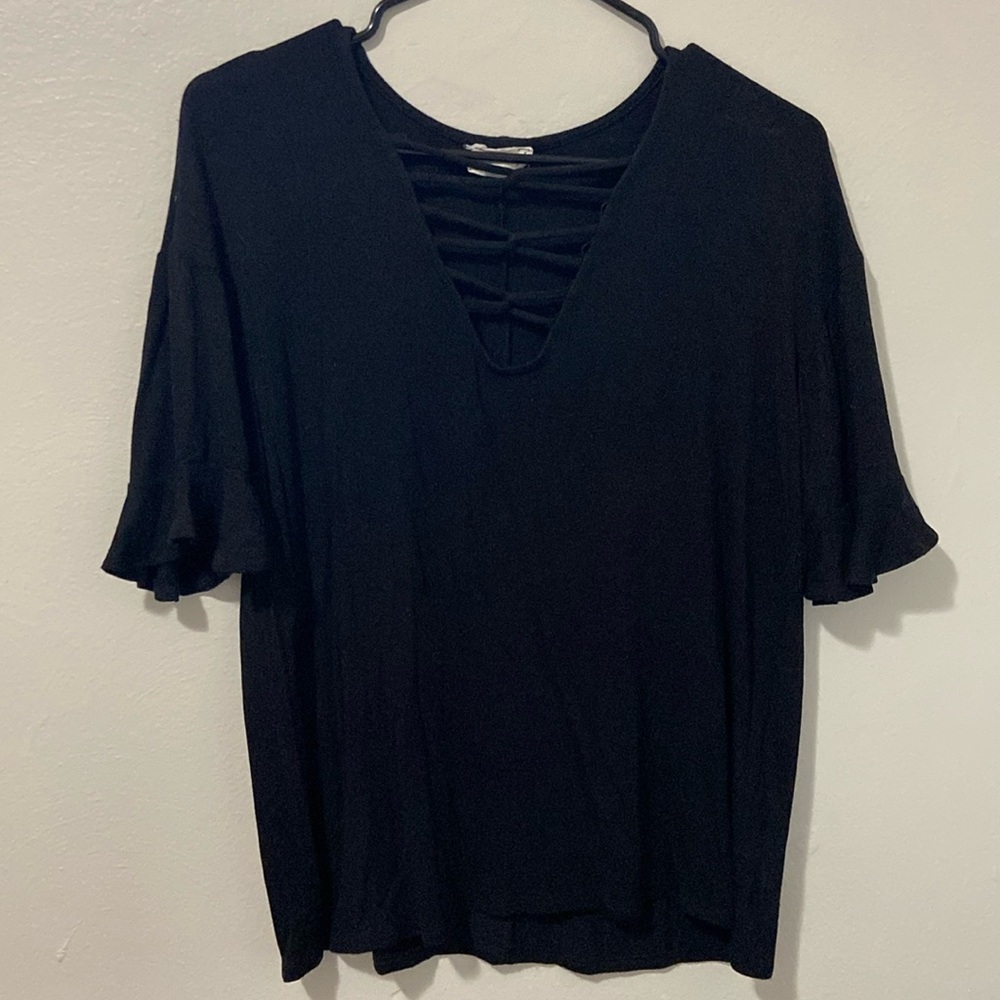 Medium women’s black blouse with ruffle sleeves and cross chest